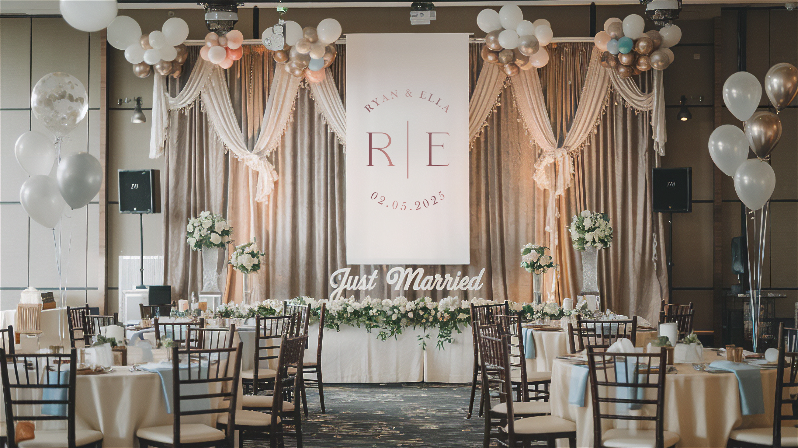 Wedding banner hanging with monogram in reception room